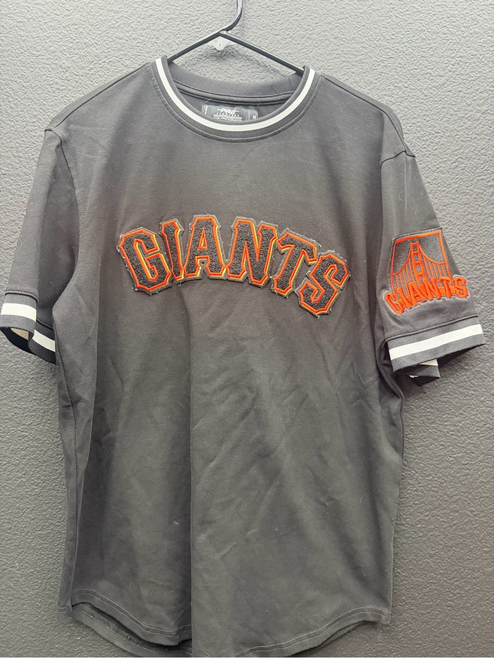 Giants Black Short Sleeve Jersey Tee with Orange Appliqué